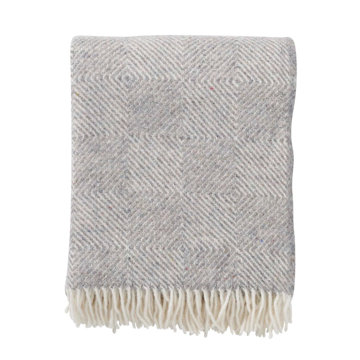 Manta Gooseye gris de Klippan, de lana con flecos