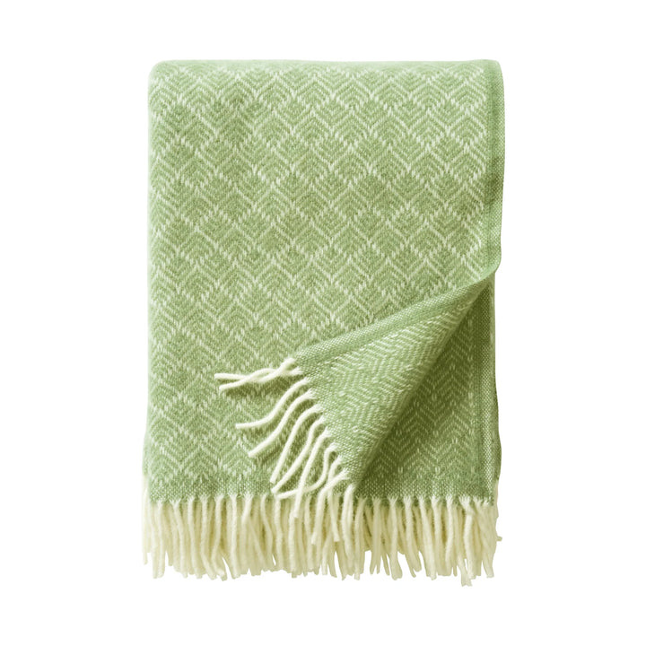 Manta Pampas verde de Klippan, tejida con flecos